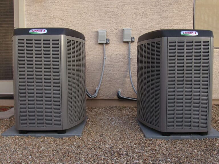 two Lennox AC units outside a phoenix home
