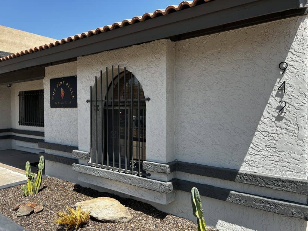 photo of a building with a sign that says The Fire Place by Magic Touch and an address 942 W 1st Ave Mesa, AZ 85210