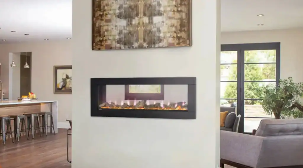 See through electric fireplace in a divider wall seperating two rooms